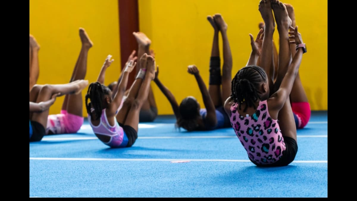 Group of gymnasts warming up together in the morning