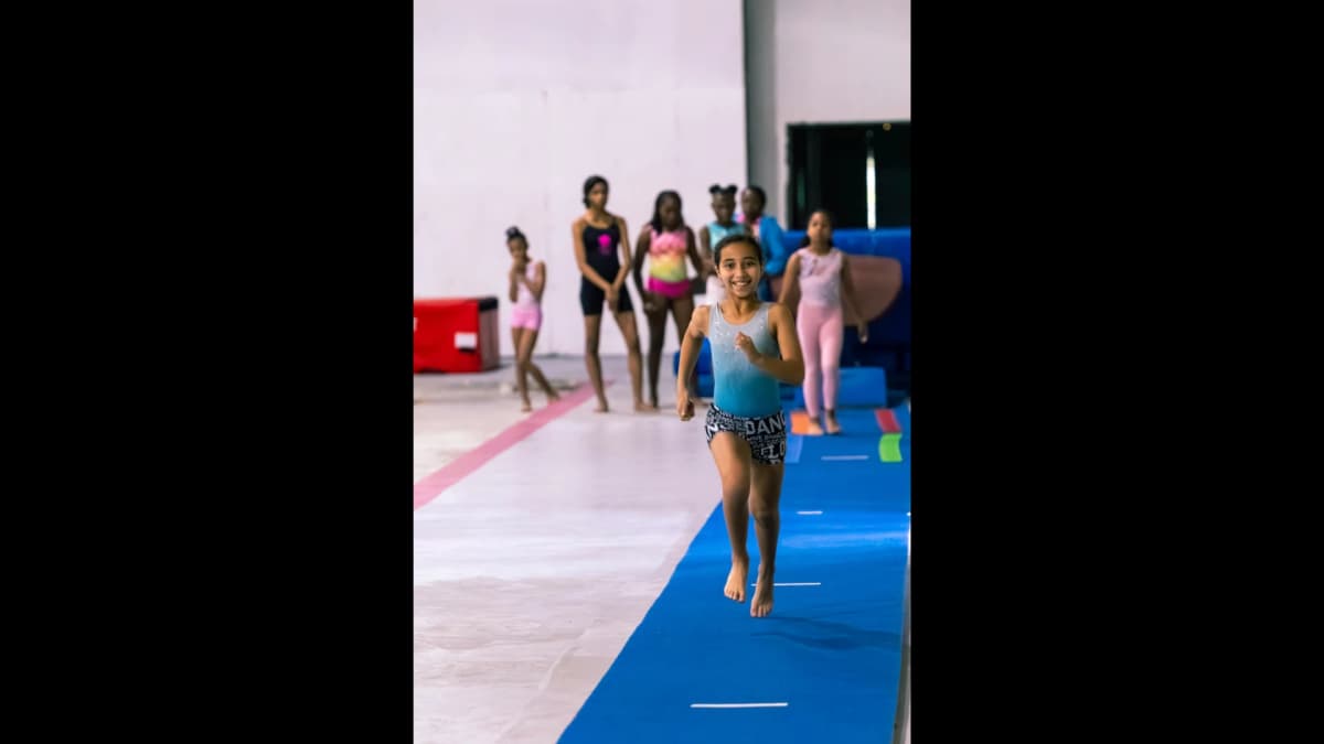 Gymnasts running during training session